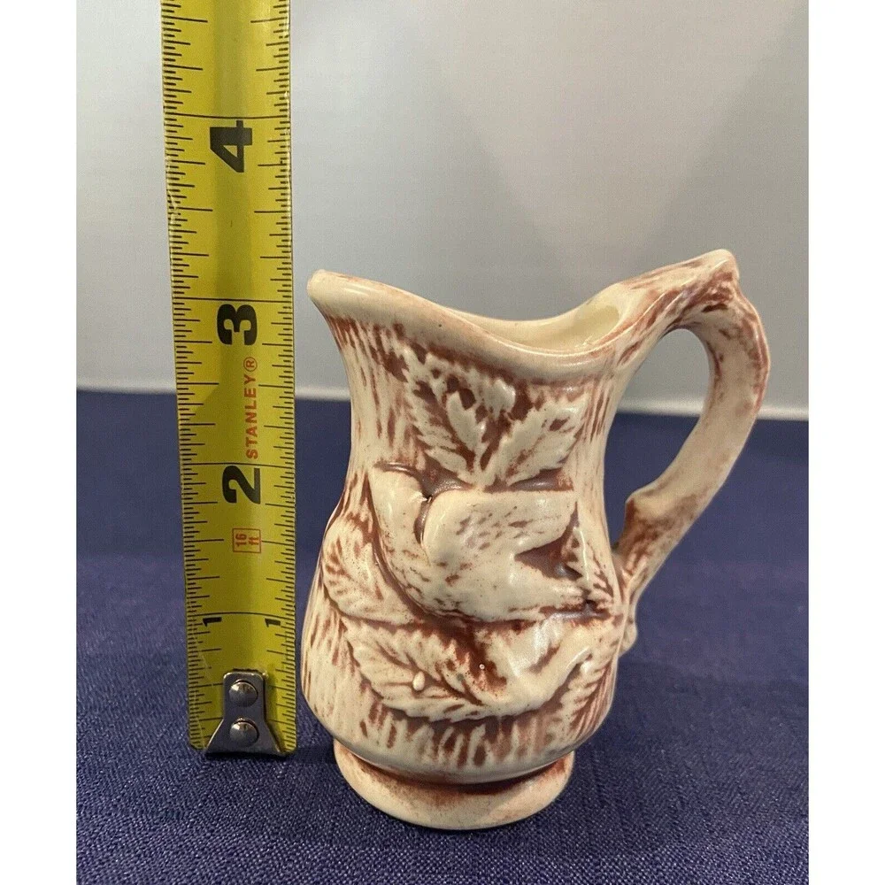 1970’S - Miniature Ceramic burgundy & Cream Embossed Flowers Water Pitcher Decor